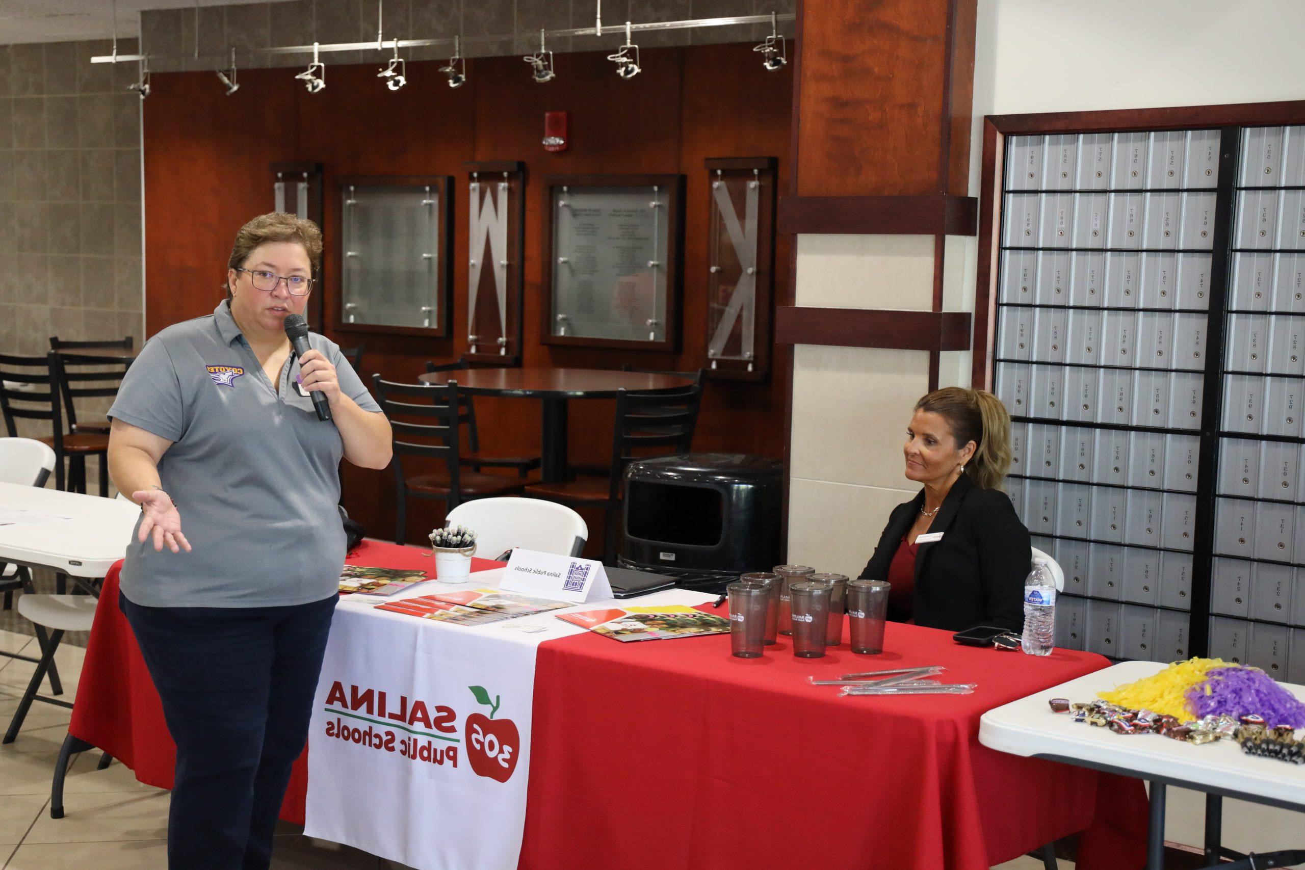 Woman speaking at fair